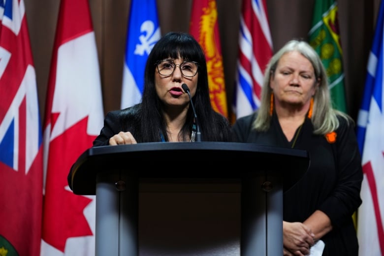 NDP member of Parliament  Leah Gazan speaks as she  is joined by Special Interlocutor Kimberly Murray and Indian Residential School survivors during a press conference on Parliament Hill in Ottawa on Thursday, Oct. 31, 2024. They are calling on the Government of Canada to recognize residential school denialism as inciting hate in the Criminal Code following the delivery of the final report of the Special Interlocutor for Missing Children and Unmarked Graves and Burial Sites Associated with Indian Residential Schools.