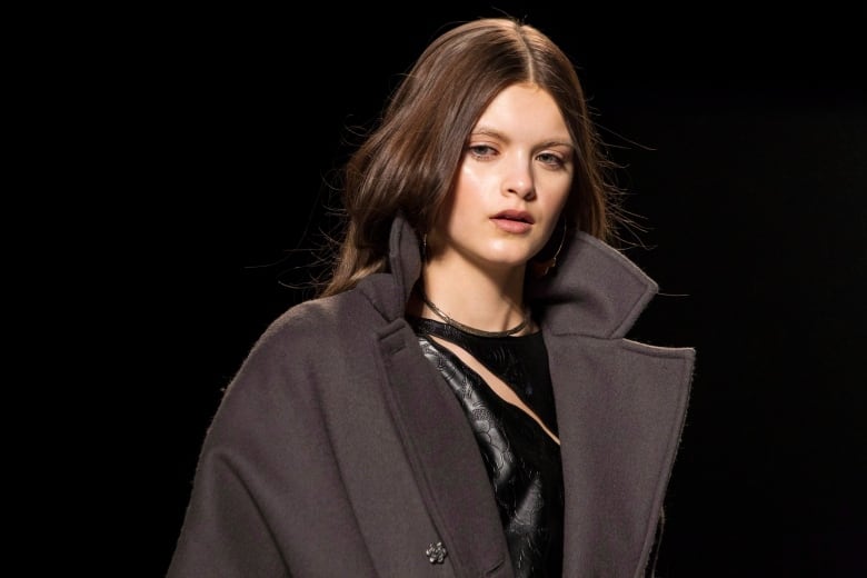 A model shows a creation from Beaufille while walking the runway during Toronto Fashion Week in Toronto on Monday March 17, 2014.