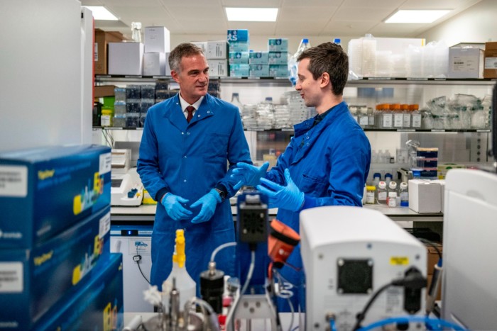 Peter Kyle (Left) at the White City Innovation District on Monday