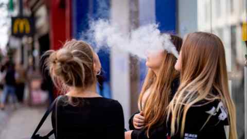 Young people use single-use vaping products in London