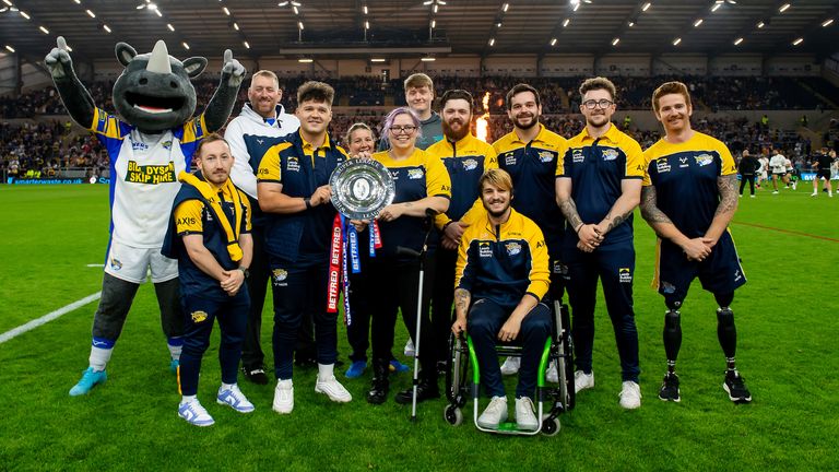 Picture by Allan McKenzie/SWpix.com - 06/09/2024 - Rugby League - Betfred Super League Round 25 - Leeds Rhinos v Hull FC - AMT Headingley, Leeds, England - Leeds Rhinos Wheelchair team with the Betfred Wheelchair Super League Leaders' Shield.