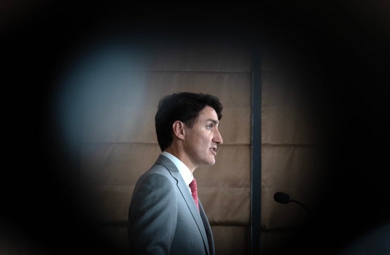 Prime Minister Justin Trudeau gestures during a news conference in Vientiane, Laos, Friday, Oct. 11, 2024.