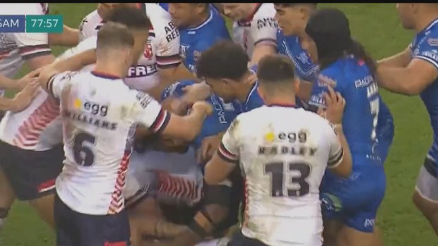 A wild all-in brawl marred the end of England's first Test victory over Samoa in Wigan.