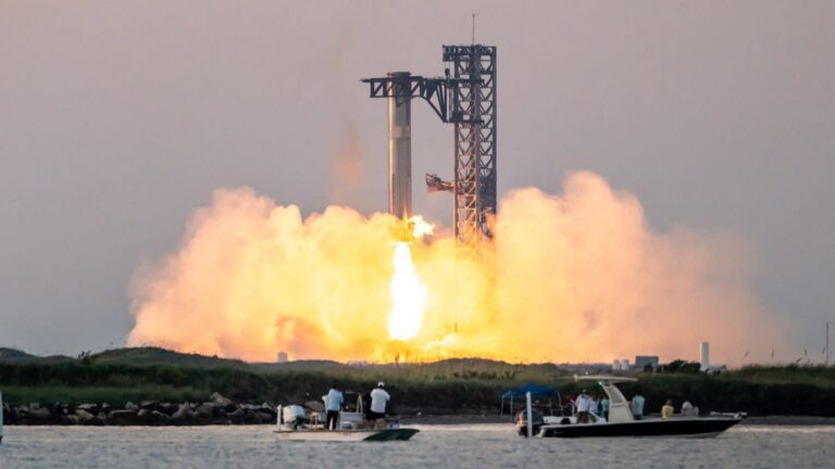 Musk’s SpaceX catches returning booster rocket in technical milestone