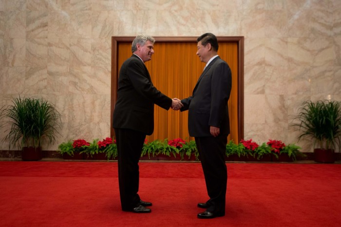 China’s President Xi Jinping greets Cuba’s first vice- president of the Council of State Miguel Diaz-Canel at the Great Hall of the People