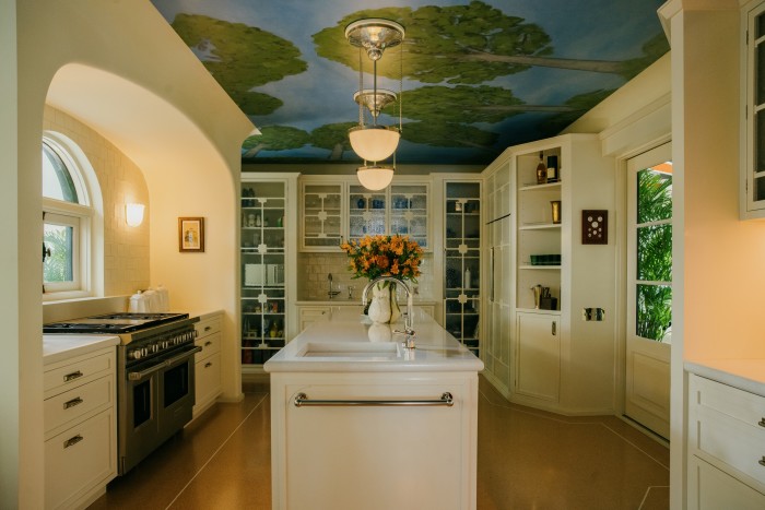 The kitchen, with its ceiling fresco by artist Lukas Geronimas