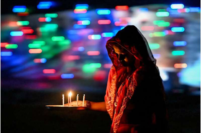 Candles are lit to celebrate Diwali, the Hindu festival of lights