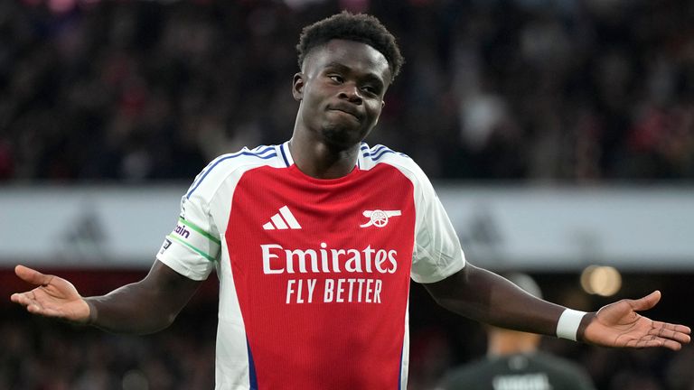 Arsenal's Bukayo Saka celebrates after scoring his side's opening goal (AP Photo/Alastair Grant)