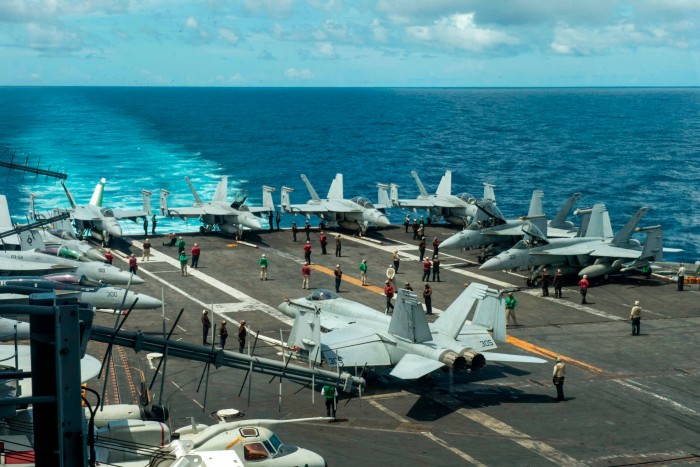 Nimitz-class aircraft carrier USS Theodore Roosevelt is seen July 4, 2024, in the South China Sea.