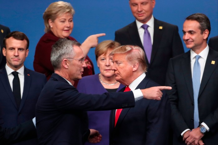 Nato secretary-general Jens Stoltenberg, centre front left, speaks with US President Donald Trump at a Nato leaders’ meeting in Watford, England, on December 4 2019