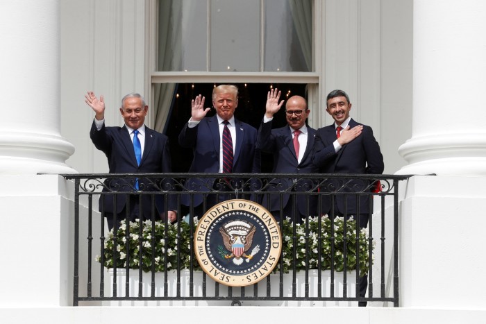 Israel’s Prime Minister Benjamin Netanyahu, US President Donald Trump, Bahrain’s foreign minister Abdullatif Al Zayani and United Arab Emirates (UAE) foreign minister Abdullah bin Zayed wave from the White House balcony after a signing ceremony for the Abraham Accords on September 15 2020