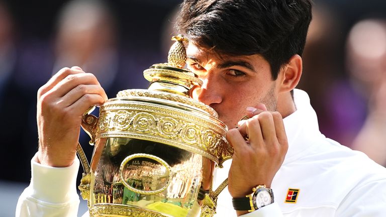 Wimbledon 2024 - Day Fourteen - All England Lawn Tennis and Croquet Club
Carlos Alcaraz celebrates with the trophy after victory in the Gentlemen's Singles Final against Novak Djokovic (not pictured) on day fourteen of the 2024 Wimbledon Championships at the All England Lawn Tennis and Croquet Club, London. Picture date: Sunday July 14, 2024.