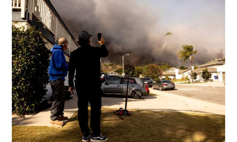 The fire is casting a huge pall of smoke over the area near Los Angeles