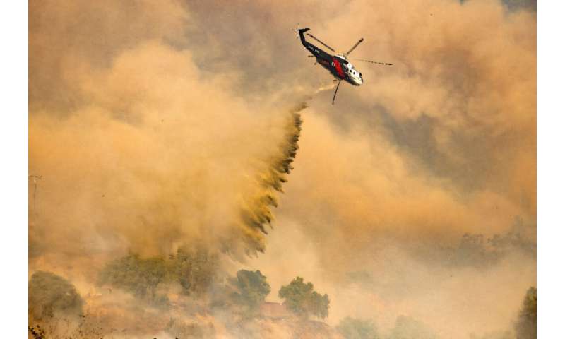 Firefighters were tackling the California blaze from the ground and from the air