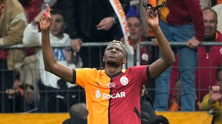 Galatasaray's Victor Osimhen celebrates after scoring his side's second goal during the Europa League opening phase soccer match between Galatasaray and Tottenham Hotspur at Ali Sami Yen stadium, in Istanbul, Turkey, Thursday, Nov. 7, 2024. (AP Photo/Khalil Hamra)