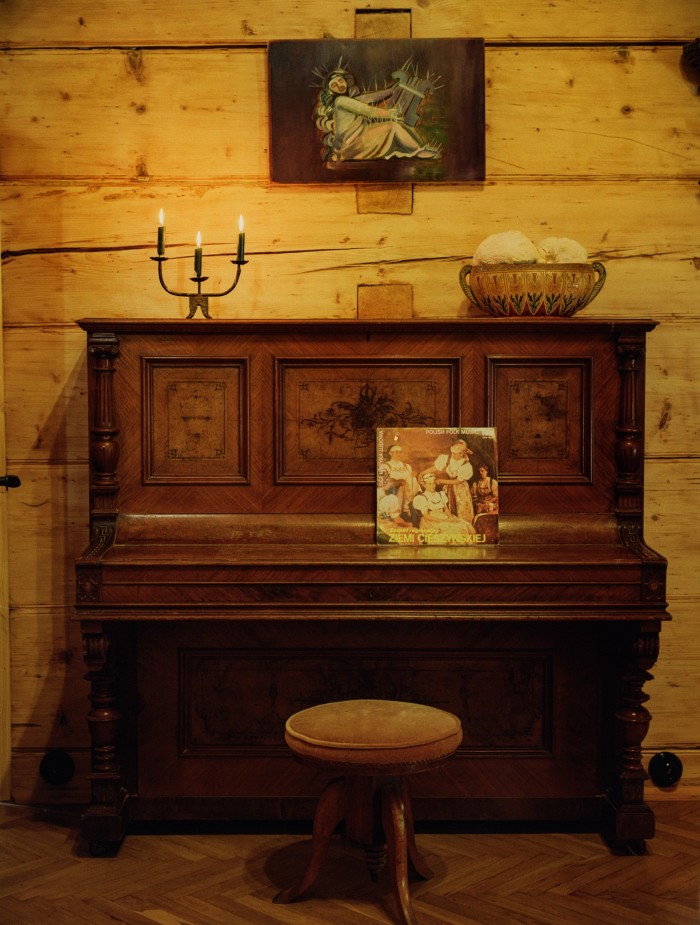 “Hekate”, 2022, by Luka Woźniczko hangs over the piano in the main hall