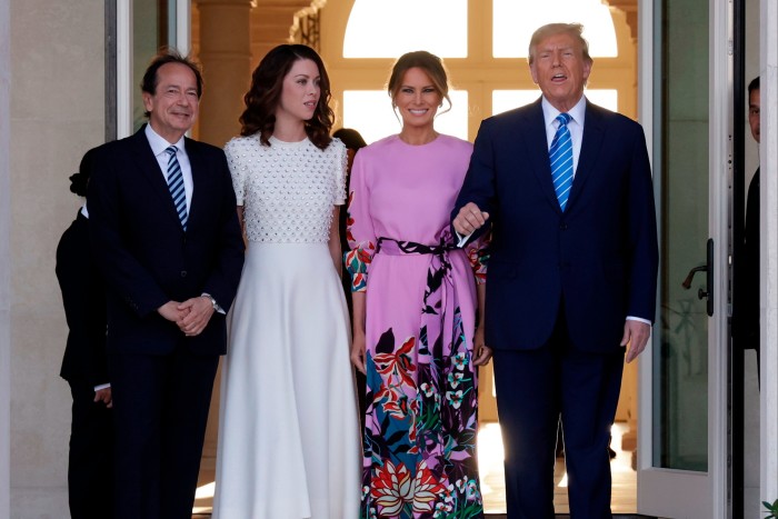 Donald Trump and Melania Trump arrive at the home of John Paulson and Alina de Almeida 