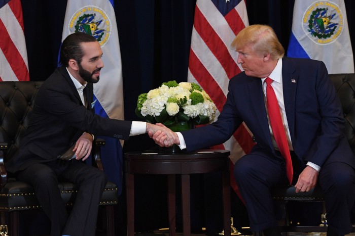 El Salvador’s President Nayib Bukele, left, shakes hands with Trump at a meeting in New York in 2019