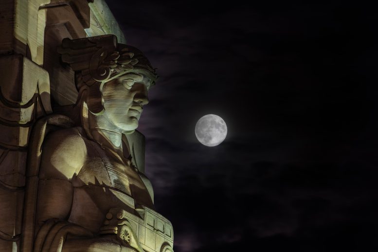 Supermoon Behind Guardians of Traffic Statue