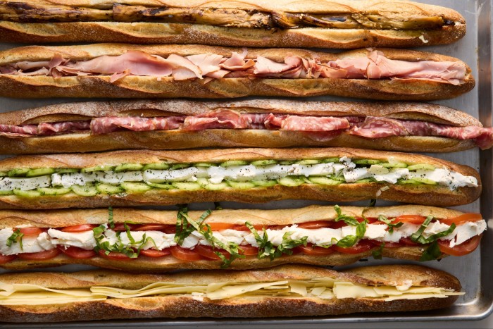 A row of prepped baguettes