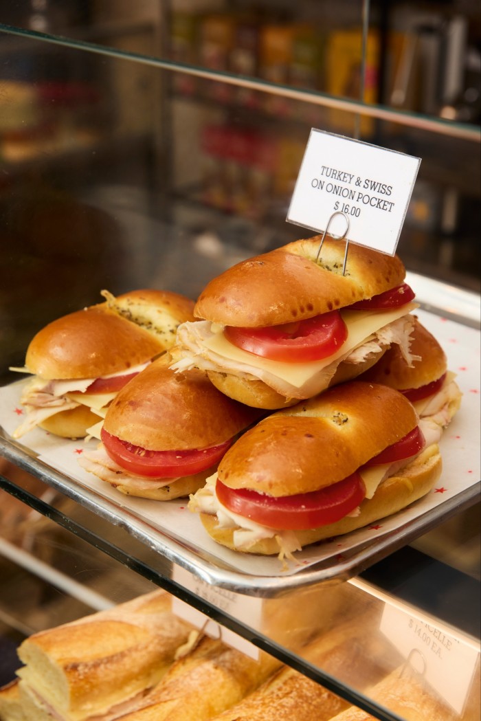 Turkey and Swiss cheese sandwiches on onion pocket bread