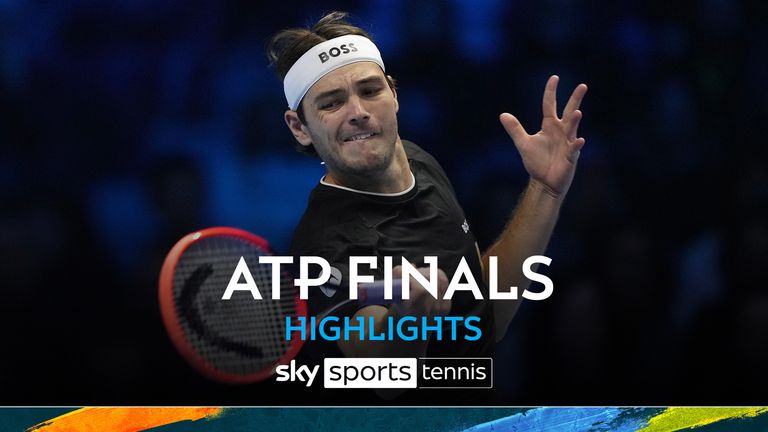 United States&#39; Taylor Fritz returns the ball to Australia&#39;s Alex de Minaur during their singles tennis match of the ATP World Tour Finals at the Inalpi Arena, in Turin, Italy, Thursday, Nov. 14, 2024. (AP Photo/Antonio Calanni)