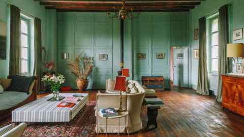 Watercolours by Alex Russell Flint’s great-grandfather William in the salon at his home in Argenton-Château