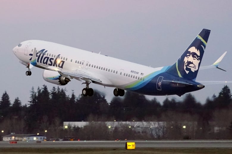 A plane takes off from a runway.