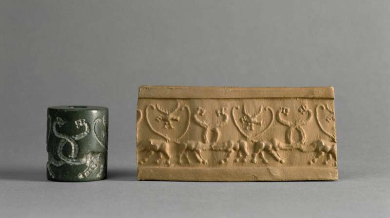 The origin of writing in Mesopotamia is tied to designs engraved on ancient cylinder seals