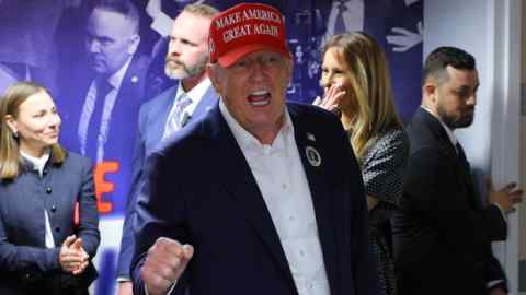 Republican presidential nominee and former U.S. President Donald Trump, accompanied by former U.S. first lady Melania Trump