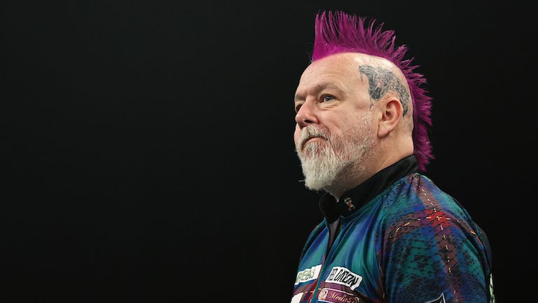 Peter Wright bowed out of the Grand Slam of Darts after three group-stage defeats