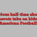 Hilarious half-time show as mascots take on kids at American Football!