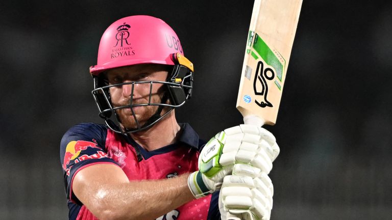 Rajasthan Royals' Jos Buttler watches the ball after playing a shot during the Indian Premier League (IPL) Twenty20 cricket match between Kolkata Knight Riders and Rajasthan Royals at the Eden Gardens in Kolkata on April 16, 2024. (Photo by DIBYANGSHU SARKAR / AFP) / -- IMAGE RESTRICTED TO EDITORIAL USE - STRICTLY NO COMMERCIAL USE --