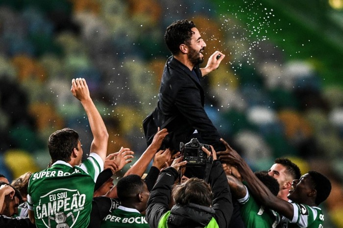 Amorim is tossed in the air by players after winning  the Portuguese league title in 2021