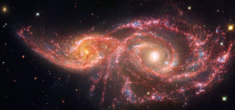 Galaxies IC 2163 and NGC 2207 (Webb and Hubble Image)