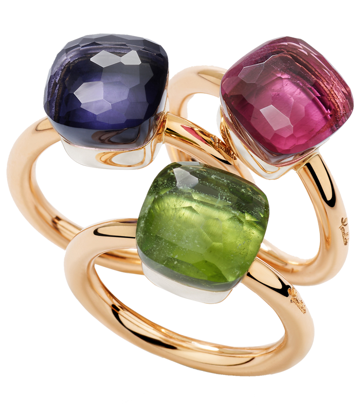 Three gold rings, each with a different coloured gemstone, one blue, one mauve, one green