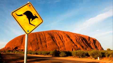 Uluru rising from the Australian outback