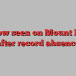 Snow seen on Mount Fuji after record absence