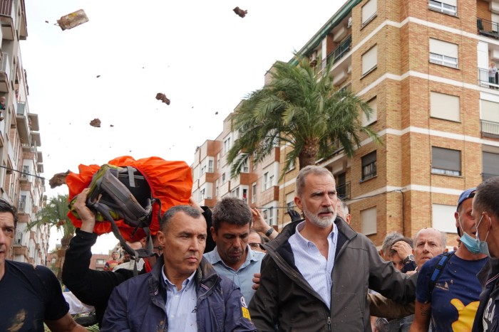 Angry residents hurled mud and debris at King Felipe of Spain during his visit to the flood-hit town of Paiporta