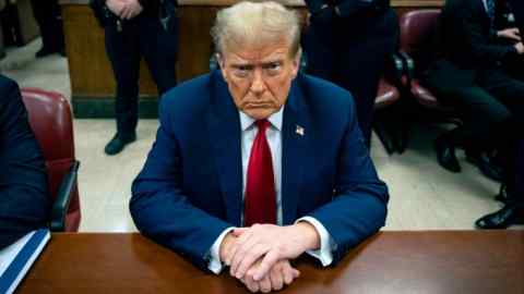 Donald Trump waits for the start of proceedings in  Manhattan’s criminal court