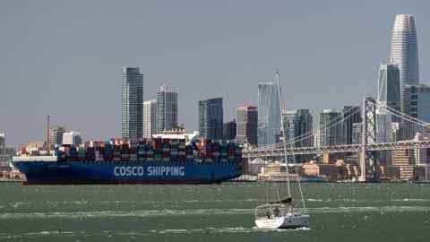 A China Ocean Shipping Group Co. (COSCO) ship in the San Francisco Bay waits to enter the Port of Oakland in Oakland, California