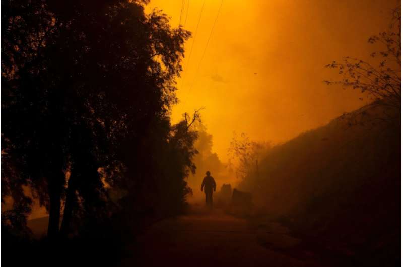 Fierce gusts up to 80 miles (130 kilometers) an hour were pushing smoke sideways and fueling flames that were scorching through California farmland